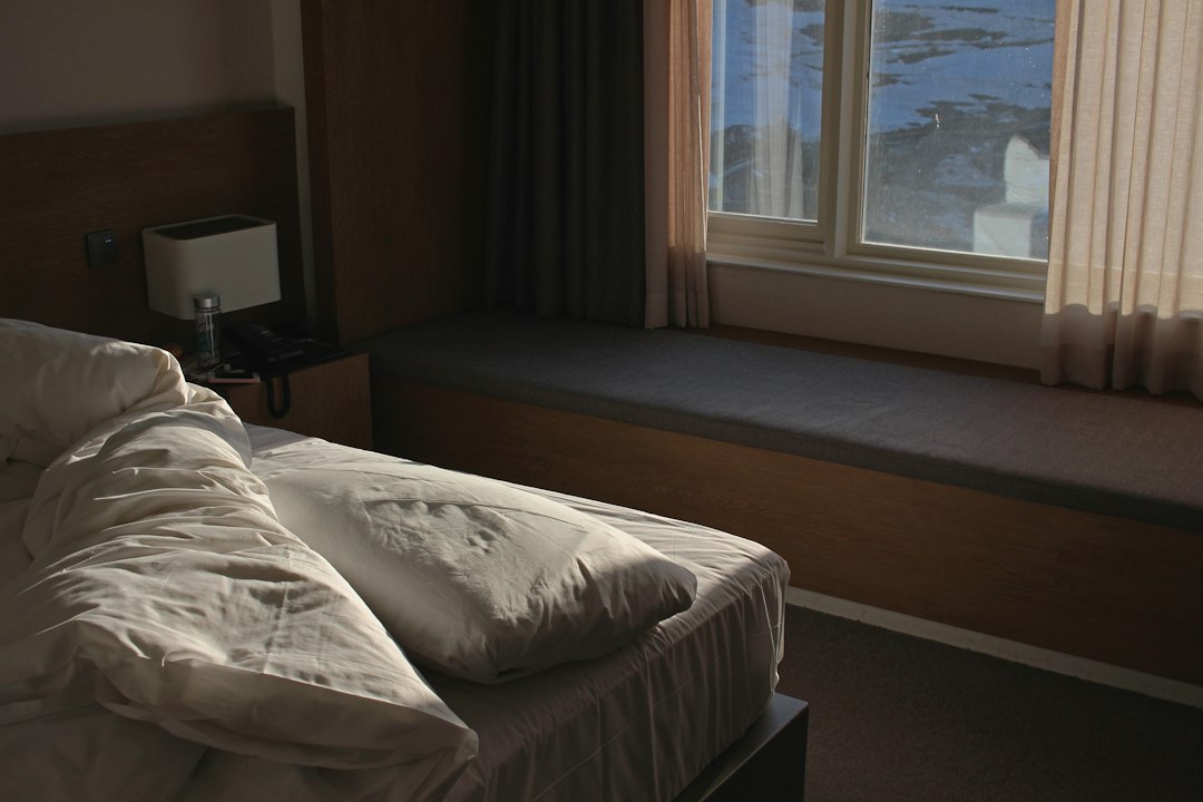 Clean bedroom illustrating bed bug prevention and monitoring