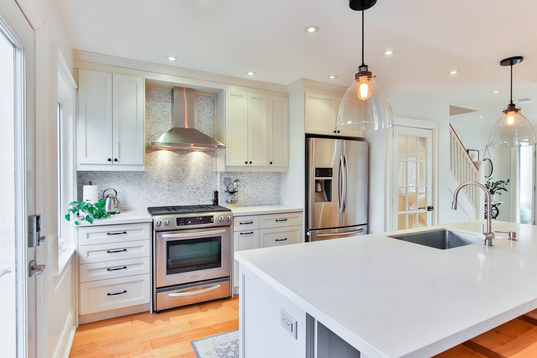 Clean kitchen and cabinets where cockroach food and water sources should be controlled
